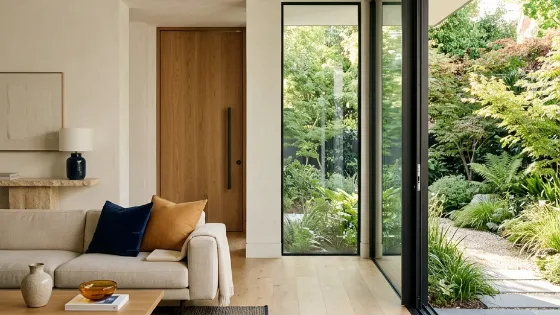 Oak interior door and sliding glass door in a living space